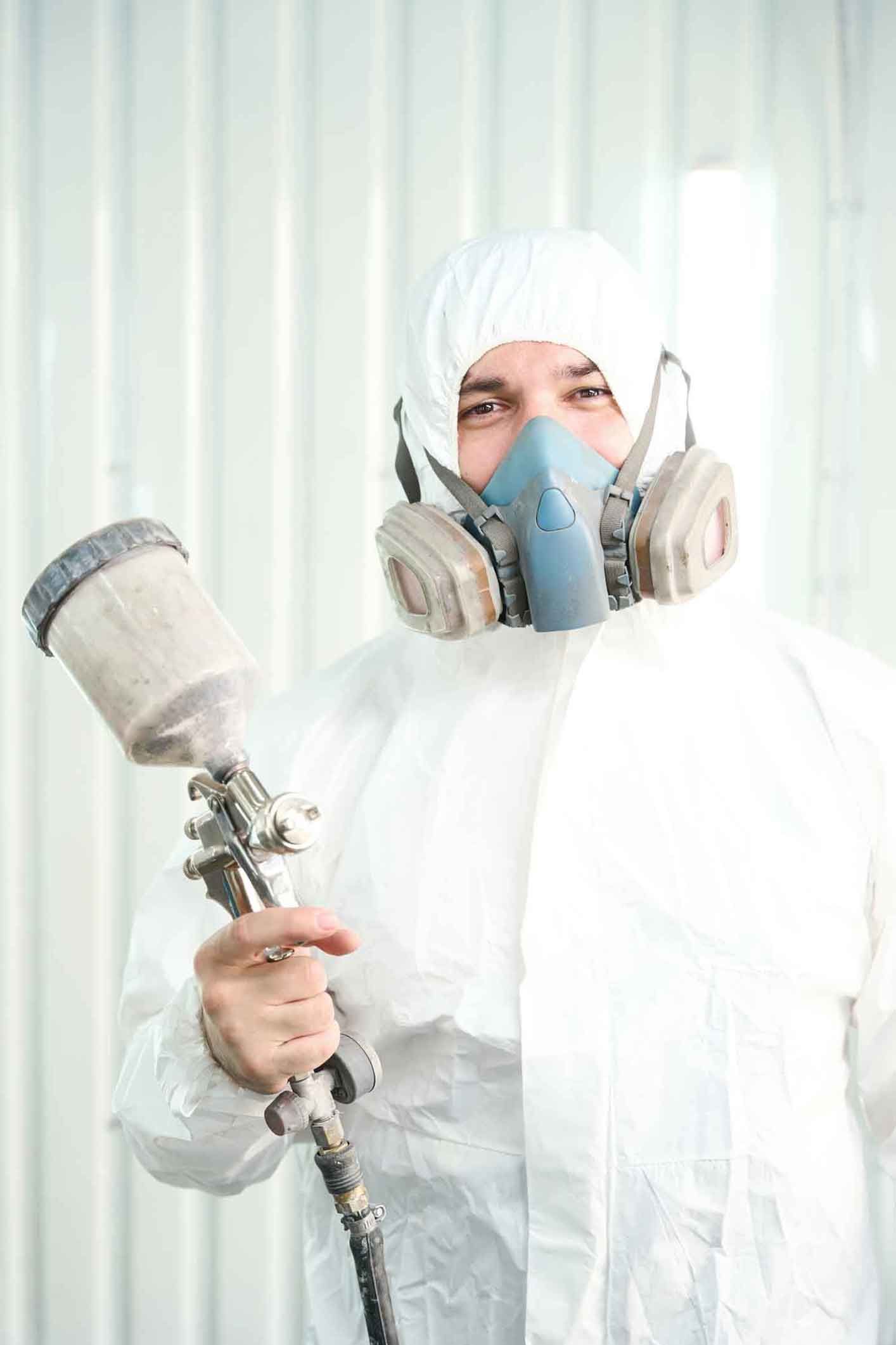 Sandblasting and protective coating work on an industrial site